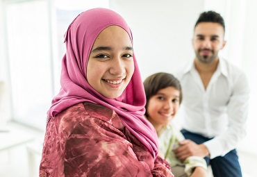 Arab woman and family-Shutterstock