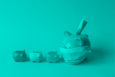 Piggy bank with mask and money, plus three small piggy banks in line