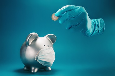 piggy bank with mask and hand with gloves and a coin