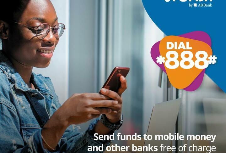 African lady holding a cell phone, logo eTumba image with Dial *888#