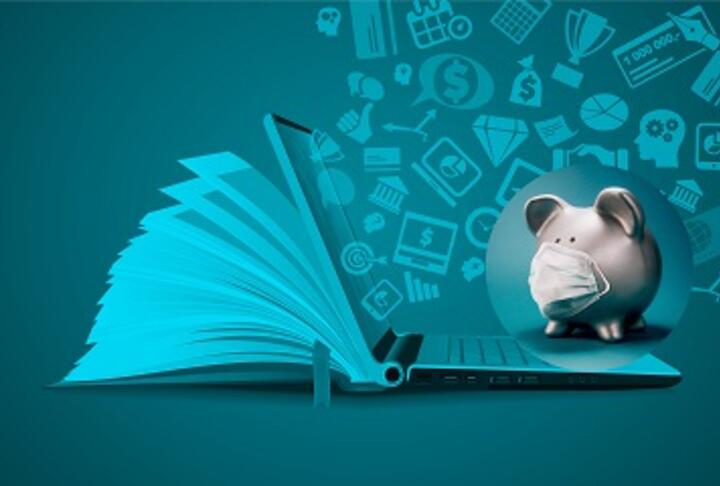 Piggy bank with mask on a computer and book with icons