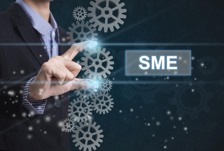 Solving the SME AML De-Risking Burden Using the Blockchain