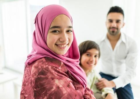 Arab woman and family-Shutterstock